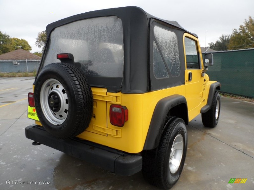 Solar Yellow 2000 Jeep Wrangler Sport 4x4 Exterior Photo #57472342