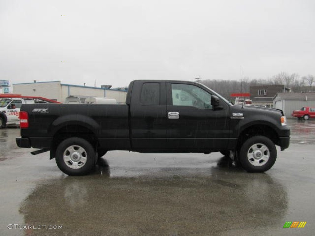 2004 F150 STX SuperCab 4x4 - Black / Black/Medium Flint photo #4