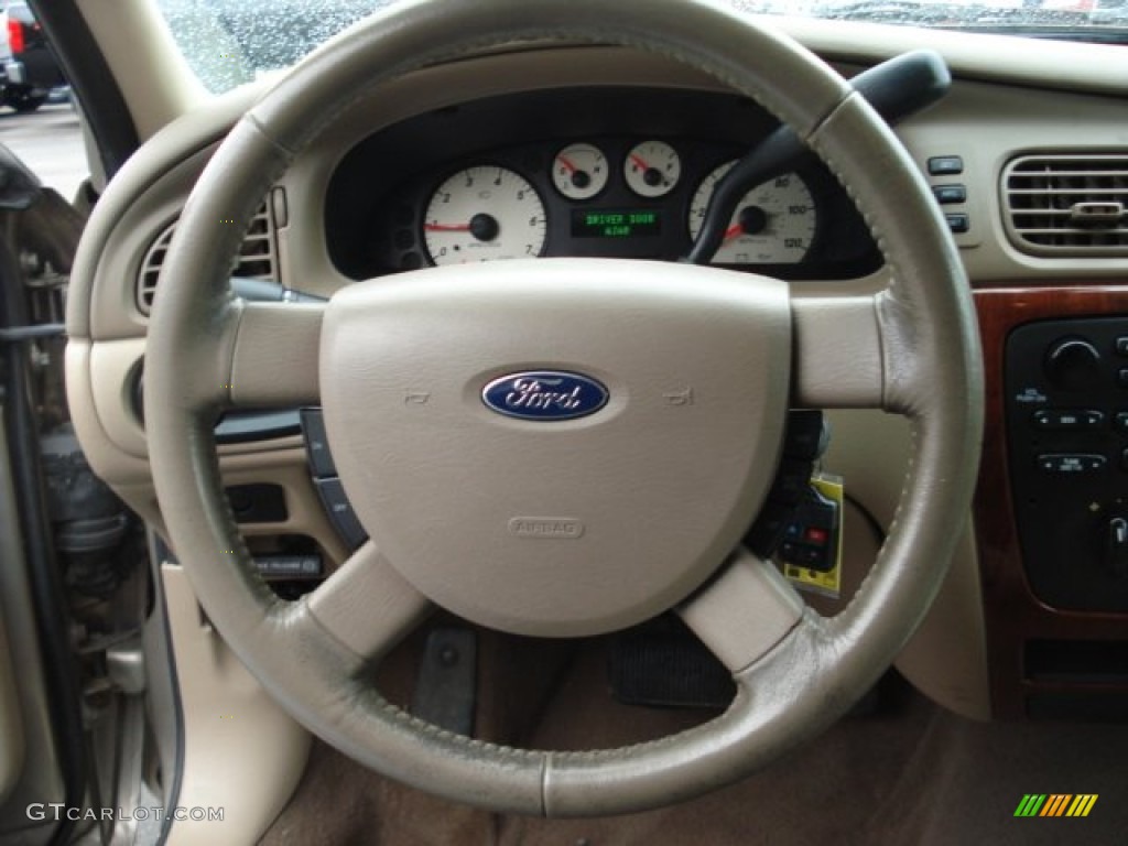 2005 Ford Taurus SEL Medium/Dark Pebble Steering Wheel Photo #57530482