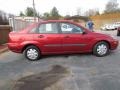 2000 Sangria Red Metallic Ford Focus LX Sedan  photo #3