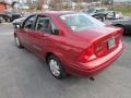 2000 Sangria Red Metallic Ford Focus LX Sedan  photo #7