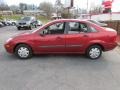 2000 Sangria Red Metallic Ford Focus LX Sedan  photo #9