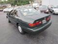 Woodland Pearl - Camry LE Photo No. 7