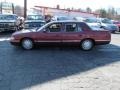 1998 Light Medici Red Metallic Cadillac DeVille Sedan  photo #9