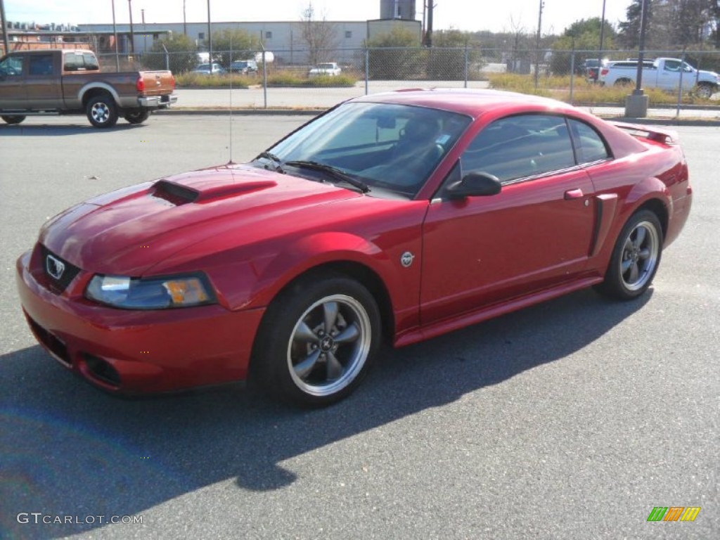 Torch Red 2004 Ford Mustang GT Coupe Exterior Photo #57625414