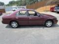 1997 Black Cherry Pearl Nissan Altima GLE  photo #3