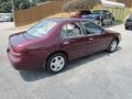 1997 Black Cherry Pearl Nissan Altima GLE  photo #4