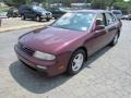 1997 Black Cherry Pearl Nissan Altima GLE  photo #11