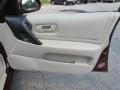 Tan 1997 Nissan Altima GLE Door Panel