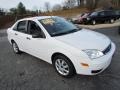 2005 Cloud 9 White Ford Focus ZX4 SE Sedan  photo #1