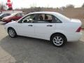 2005 Cloud 9 White Ford Focus ZX4 SE Sedan  photo #9