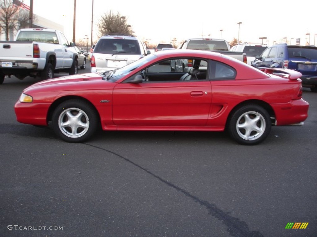 Rio Red 1997 Ford Mustang GT Coupe Exterior Photo #57660344