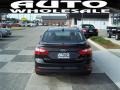 2012 Black Ford Focus Titanium Sedan  photo #3