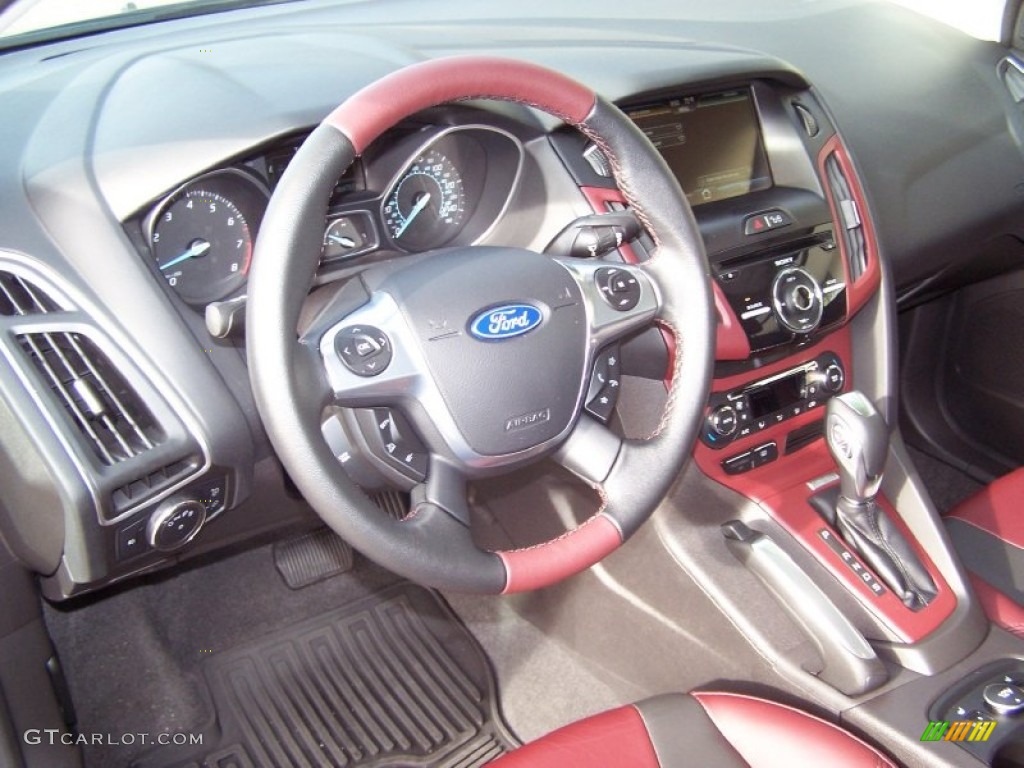2012 Ford Focus Titanium Sedan Tuscany Red Leather Dashboard Photo #57665455