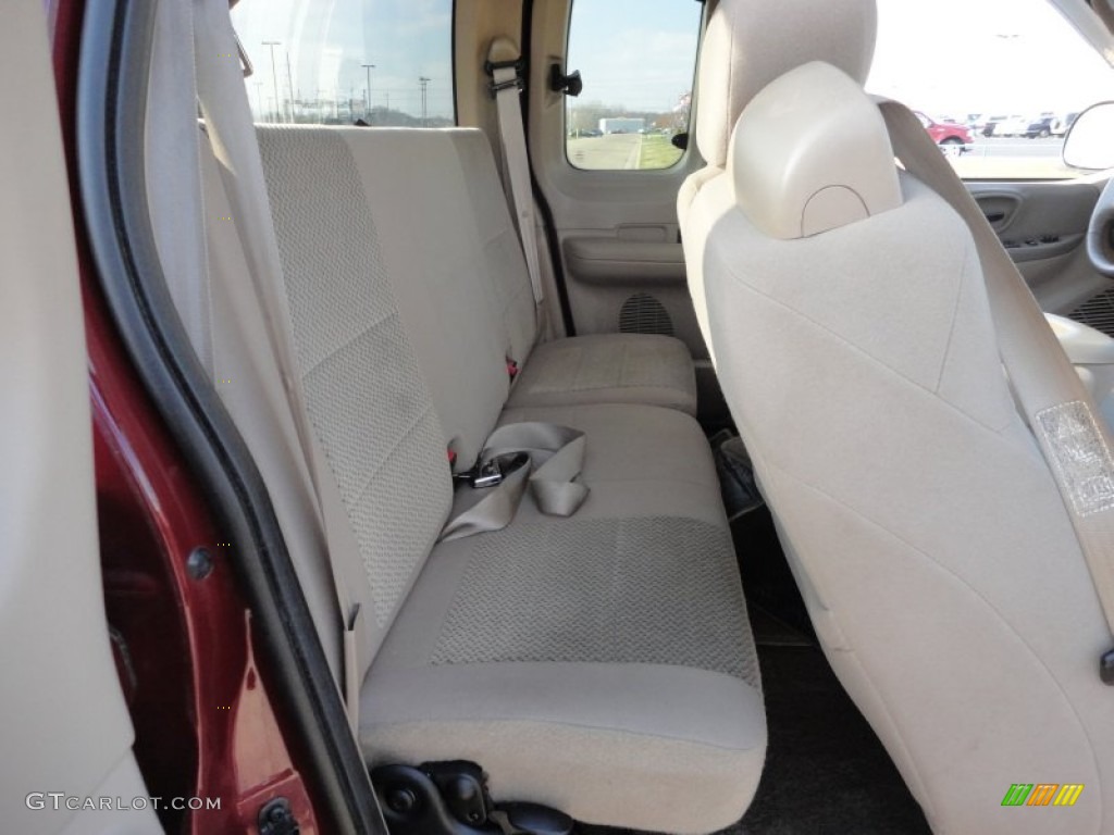 2003 F150 XLT SuperCab 4x4 - Toreador Red Metallic / Medium Parchment Beige photo #23