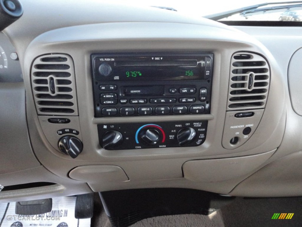 2003 F150 XLT SuperCab 4x4 - Toreador Red Metallic / Medium Parchment Beige photo #29