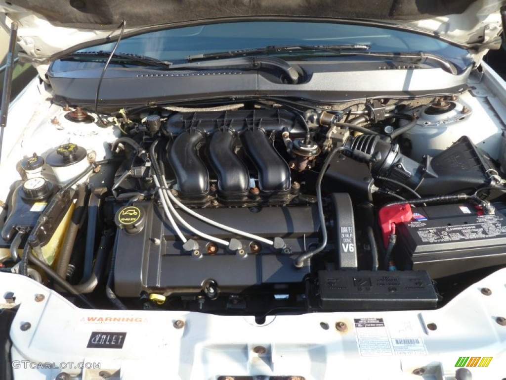 2002 Ford Taurus SES 3.0 Liter DOHC 24-Valve V6 Engine Photo #57731642