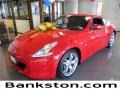 2011 Solid Red Nissan 370Z Sport Touring Coupe  photo #1