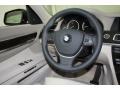2012 BMW 7 Series Oyster Interior Steering Wheel Photo