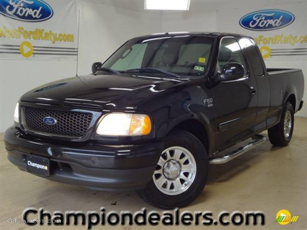 2002 F150 XLT SuperCab - Black / Dark Graphite photo #1