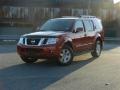 2010 Red Brick Nissan Pathfinder SE 4x4  photo #2