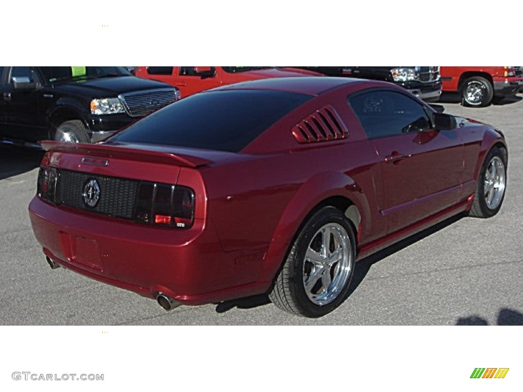 2006 Mustang V6 Deluxe Coupe - Redfire Metallic / Dark Charcoal photo #21