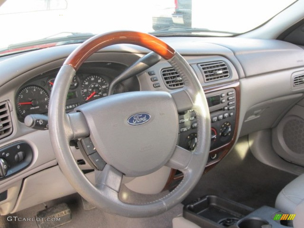 2004 Ford Taurus SES Sedan Medium Parchment Steering Wheel Photo #57824684
