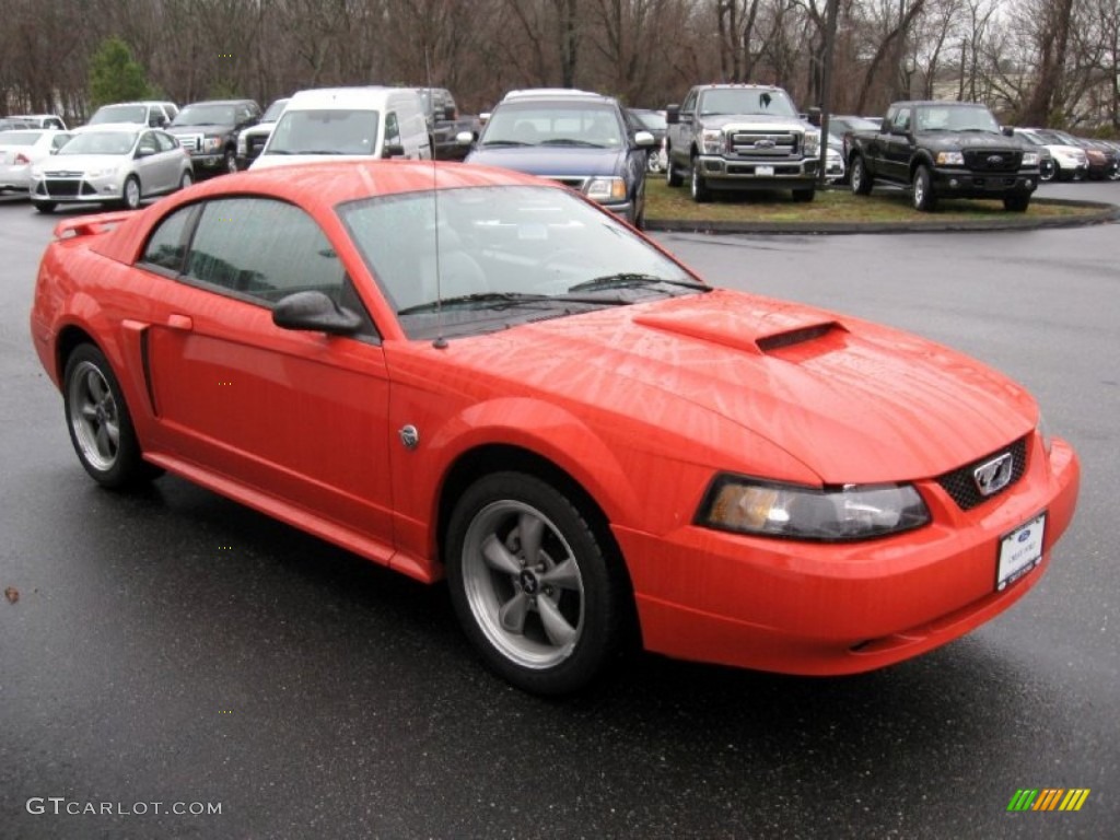 Competition Orange 2004 Ford Mustang GT Coupe Exterior Photo #57824858