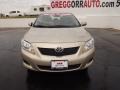 2010 Desert Sand Metallic Toyota Corolla LE  photo #2
