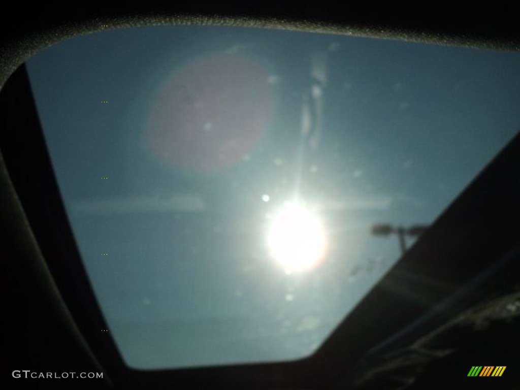 2012 200 Limited Sedan - Blackberry Pearl Coat / Black photo #9