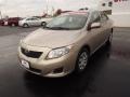 2010 Desert Sand Metallic Toyota Corolla LE  photo #3