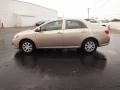 2010 Desert Sand Metallic Toyota Corolla LE  photo #4