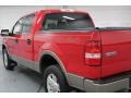 2004 Bright Red Ford F150 Lariat SuperCrew 4x4  photo #23