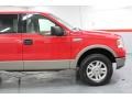 2004 Bright Red Ford F150 Lariat SuperCrew 4x4  photo #35