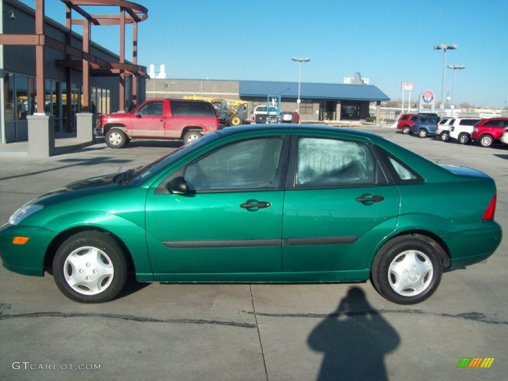 Grabber Green Metallic 2002 Ford Focus LX Sedan Exterior Photo #57908248