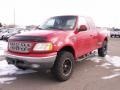 Bright Red 1999 Ford F150 XLT Extended Cab 4x4