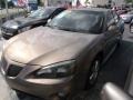 Bronzestone Metallic - Grand Prix Sedan Photo No. 1