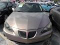 Bronzestone Metallic - Grand Prix Sedan Photo No. 2