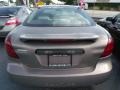 Bronzestone Metallic - Grand Prix Sedan Photo No. 3