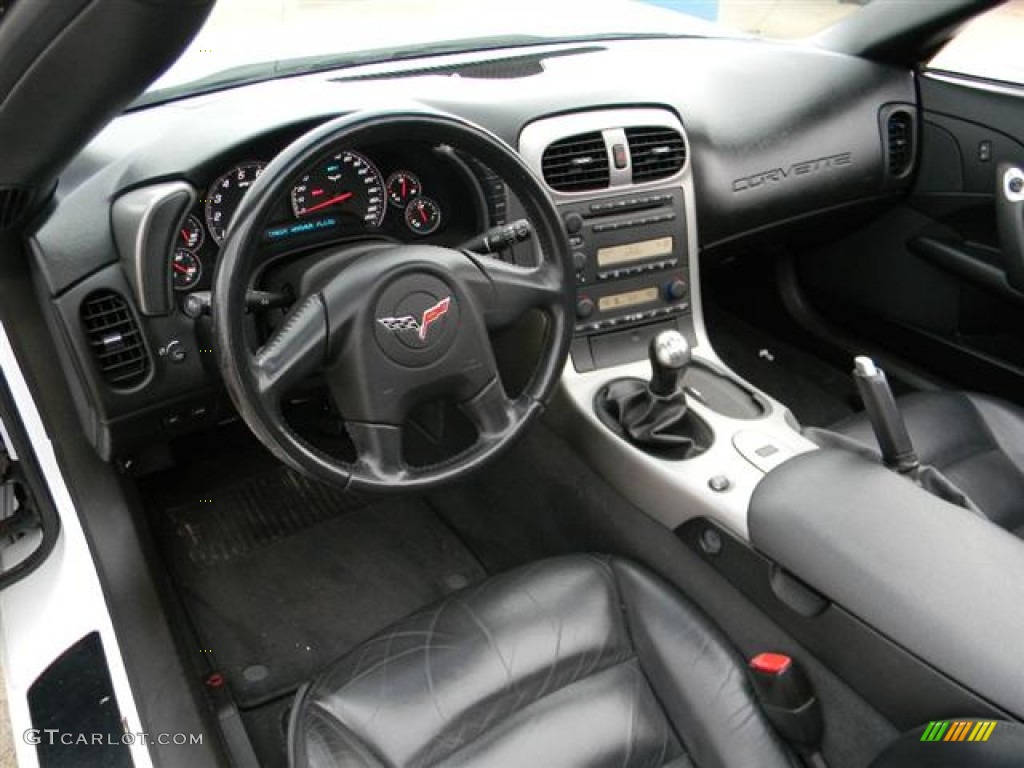 Ebony Interior 2005 Chevrolet Corvette Coupe Photo #57965325