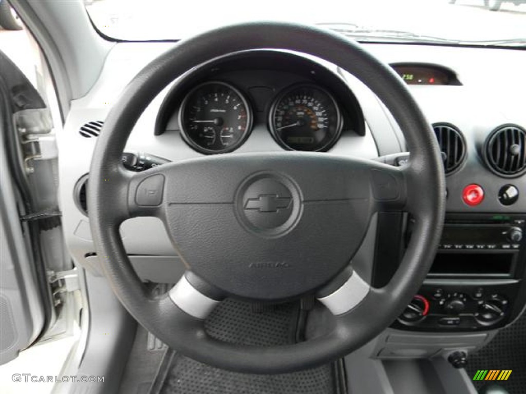 2004 Chevrolet Aveo LS Hatchback Gray Steering Wheel Photo #57965639