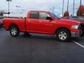 2011 Flame Red Dodge Ram 1500 SLT Quad Cab 4x4  photo #2