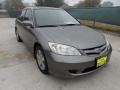 2004 Magnesium Metallic Honda Civic EX Sedan  photo #1
