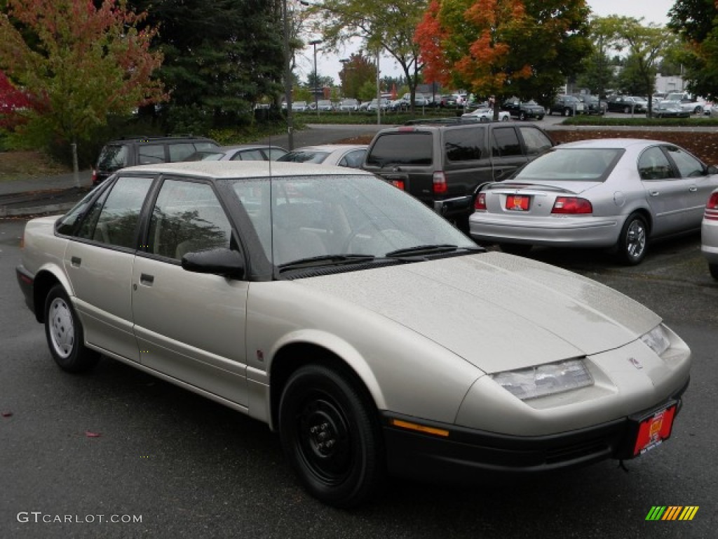 1995 S Series SL1 Sedan - Gold Metallic / Tan photo #2