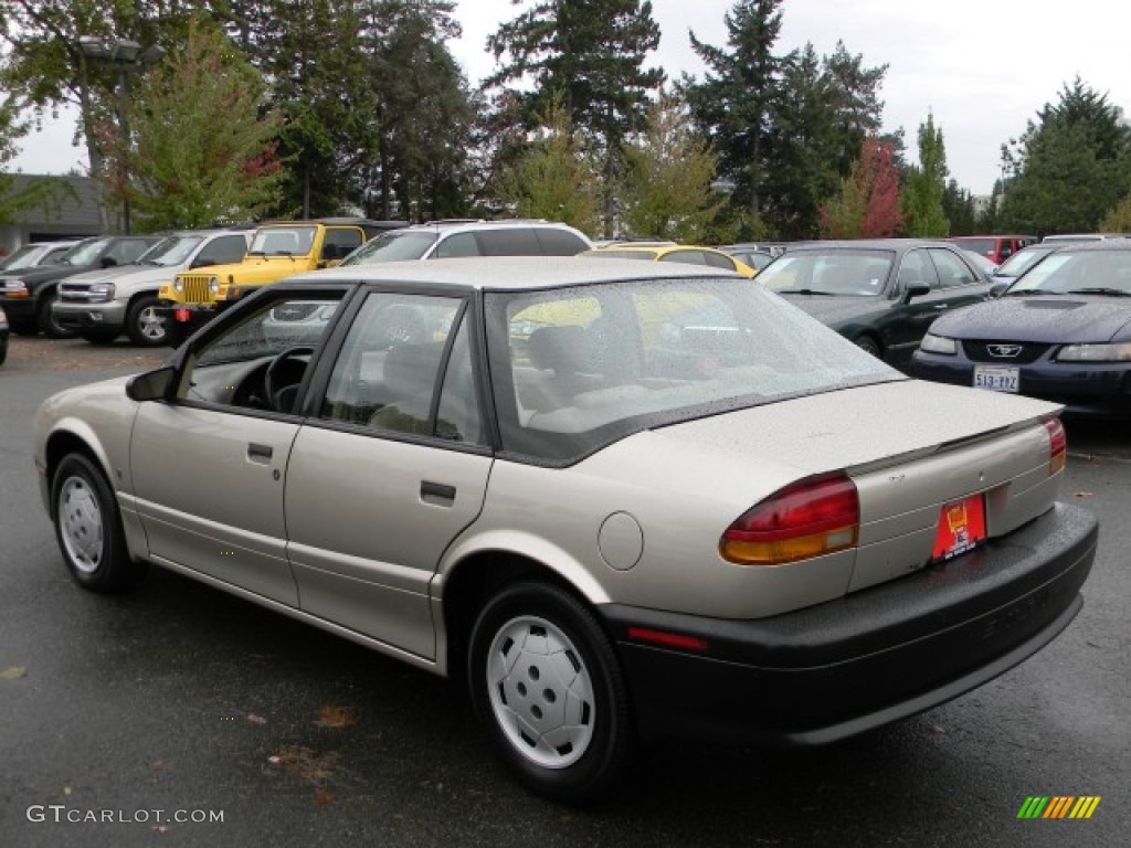 1995 S Series SL1 Sedan - Gold Metallic / Tan photo #4