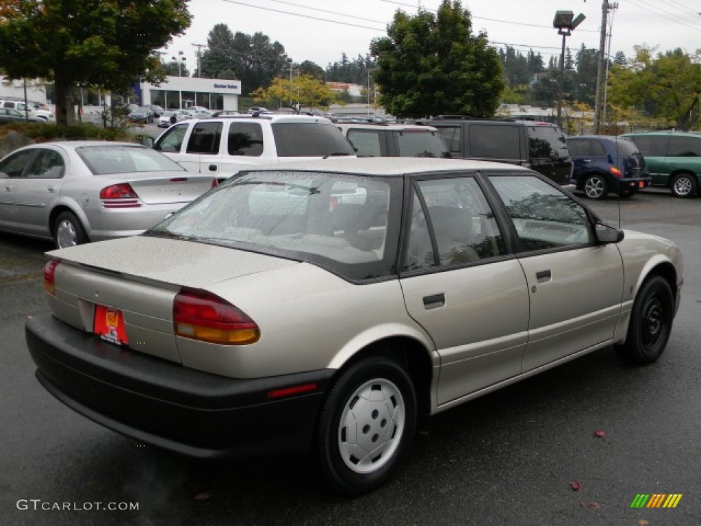 1995 S Series SL1 Sedan - Gold Metallic / Tan photo #5