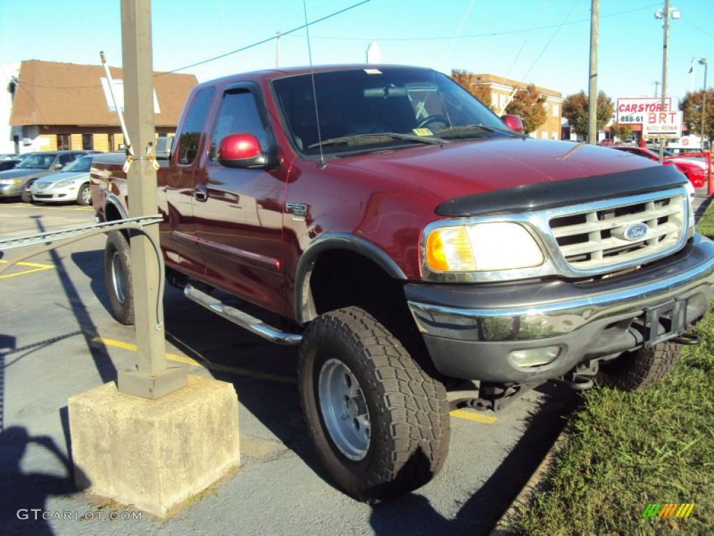 2002 F150 XLT SuperCab 4x4 - Toreador Red Metallic / Dark Graphite photo #1