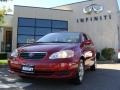 2006 Impulse Red Pearl Toyota Corolla LE  photo #1