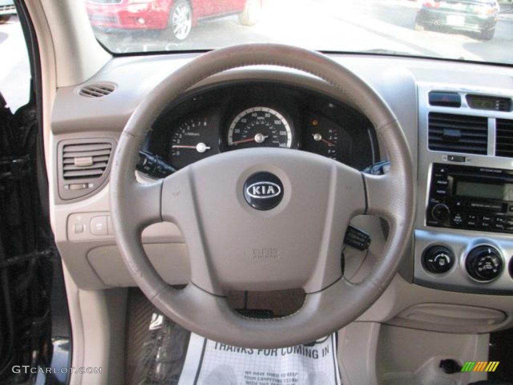 2005 Kia Sportage EX 4WD Beige Steering Wheel Photo #58130287