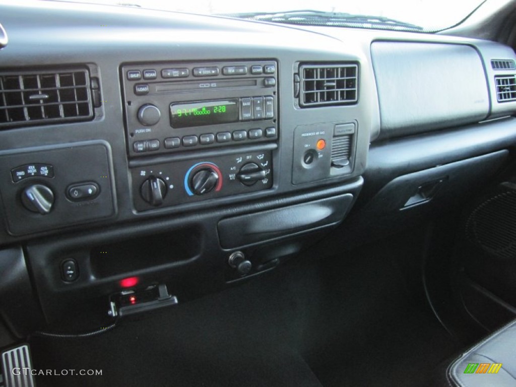 2004 F250 Super Duty Harley Davidson SuperCab 4x4 - Black/Competition Orange / Black photo #22